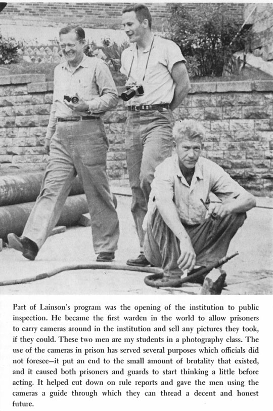 Convicts with cameras walk freely among other prisoners