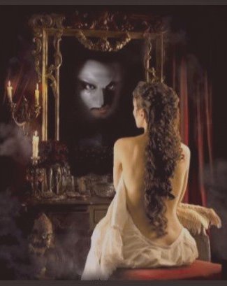 Christine Daae, with her beautiful curly long hair looking at the mirror, there she sees her Angel of Music, the Phantom of the Opera.