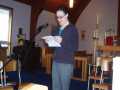 Cara Drover Reading the Gospel Lesson, Arnold's Cove, April 23, 2006