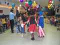 Children having fun with the clowns, Mickey & Minnie, and Red Riding Hood at Children's Fun Day, Arnold's Cove, June 3, 2006