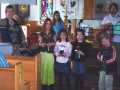 Sunday School Class Four Receiving a Special Bible, The Good Shepherd Youth Service, Norman's Cove, April 30, 2006
