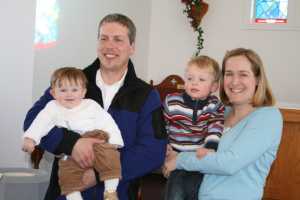Jacob with his parents and little brother, Devon