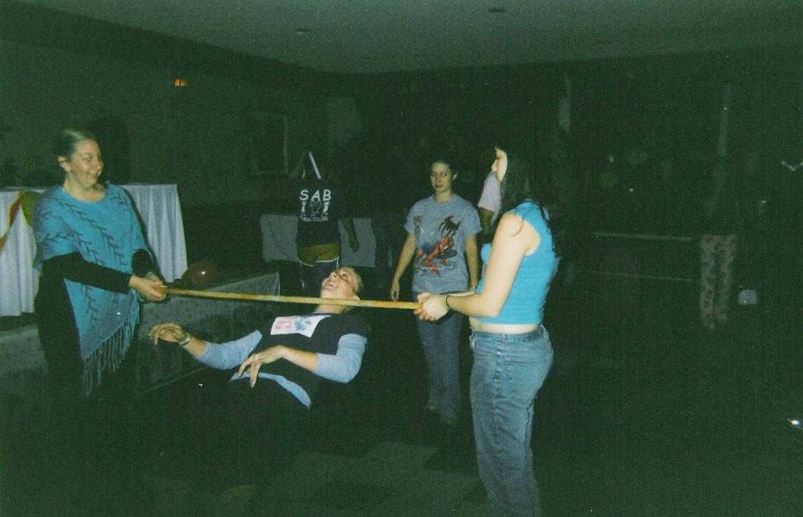 NY Speaking 2004 - Binghamton President Kelly doing the limbo! There's Lt. Governor Nicole and Sunshine Chair Alyssa holding the limbo stick!