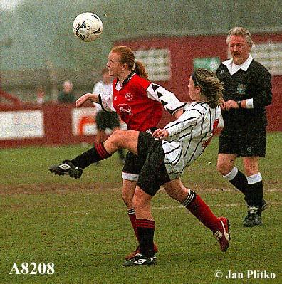 Ilkeston player Emma Collins heads the ball clear!