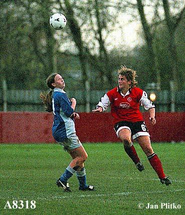 Ilkeston captain Georgia Plinston heads the ball clear!