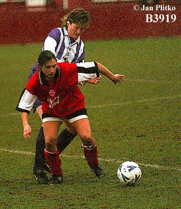 Hayley Saggers keeps the ball from a Blyth Spartan's player