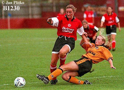 Ilkeston striker Lesley Higham is denied a shot on goal!
