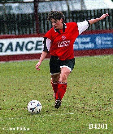 Ilkeston right back Michelle Bates sends a ball forward!