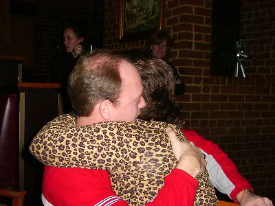 ...and it's a bear hug to the head...probably means yes