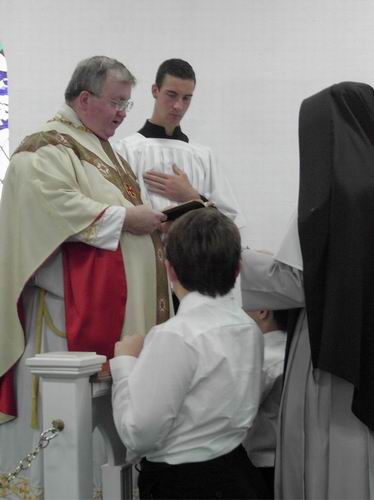 Baptismal Font and St. Joseph