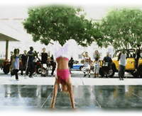 Check her out. You don't see Christina Aguilera doing flips like that!