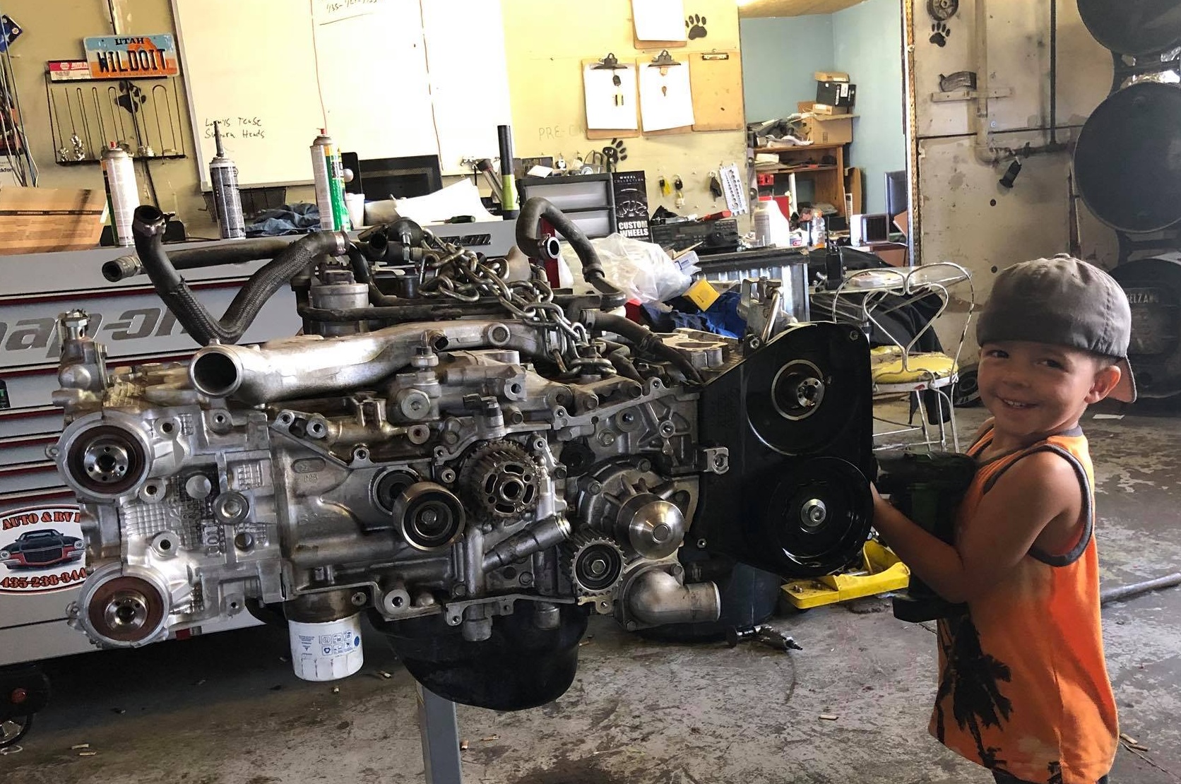 Kid near engine