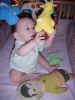 October 4, 2001: pulling on the mobile; with Dave's Eskimo Pie doll