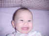 October 6, 2001: can you see the two bottom teeth?