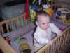 October 6, 2001: pulled to standing by herself