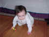 February 23, 2002: trying to sneak out under the gate backwards