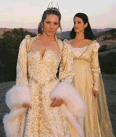 A Renaissance wedding dress!!  Now why didn't I think of that before?  The dress in the front would be mine and the one in the back would be for my bridesmaids.