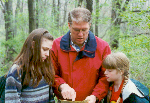 Holly, with Daddy and Whitney look over a map at Hidden Lake Gardens near Irish Hills, Michigan - Summer 1998