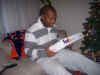 jackie looking at jasmine's presents.jpg (76254 bytes)