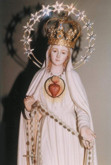 Inmaculado Coraz�n de Mar�a,
 ruega por nosotros ahora
 y en la hora de nuestra muerte. Am�n.