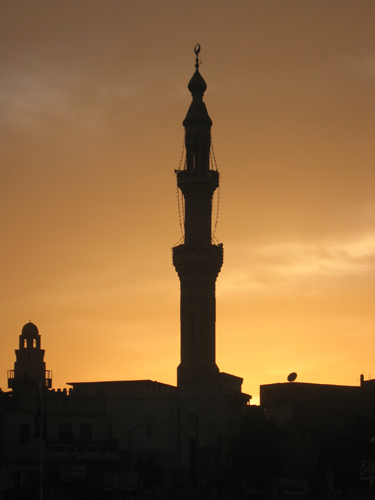 This was my view from the Nile River during a Spring 2004 trip to Egypt. The sun was setting late in the evening, providing a perfect backdrop for this mosque in Luxor, Egypt.