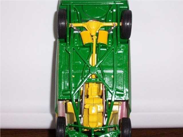 The chassis is painted custom green and yellow.
