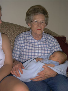 Grandma Duckett holds Marshall for the first time