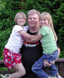 Uncle Jeremy with Zandi & Megan at Great Grandpa & Janie's house, for Uncle Wyatt's graduation 6-2006