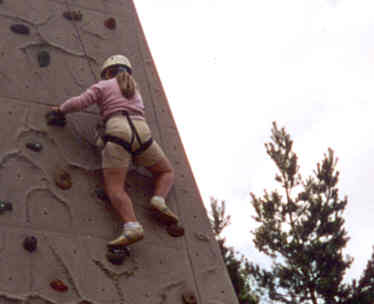 Girl on a climbing wall