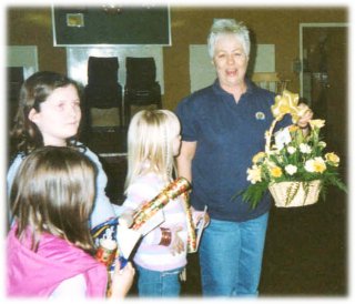 Glo receiving her flowers