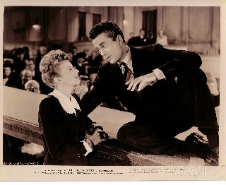 At a Sunday Show he sees Julie Benson(Evelyn Keyes) Sings April Showers.