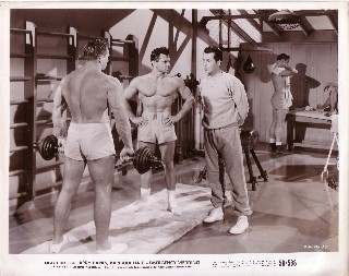 Larry intimidated by the 'muscle' as he visits the Gym.
