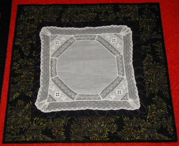 lacy handkerchief on dark background