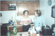 Jackie and Mel guard the dishes in the sink.