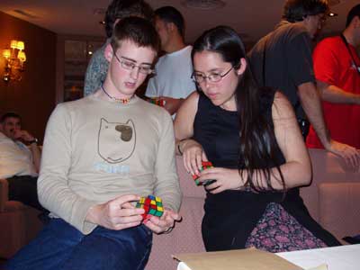 Dan Harris teaching Jasmine Lee a new algorithm