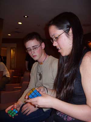Jasmine Lee attempting to remember the algorithm Dan Harris just demonstrated