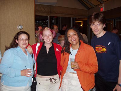 Jean (Jon Morris' wife), Jennifer (Lars Petrus' wife), Yasmara (Michiel van der Blonk's wife) and Peter