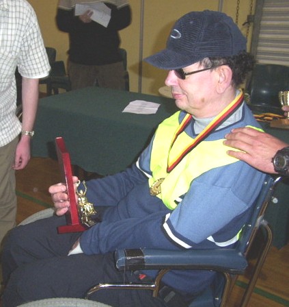 John receiving his balloon football trophy for the 03 season.