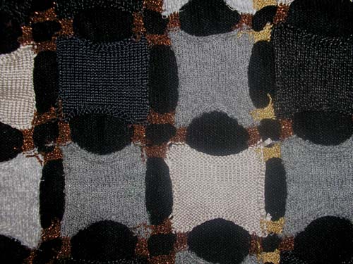 metailic yarns machine knitted squares and joined with copper yarn. Design Project. Christian Symbolism.