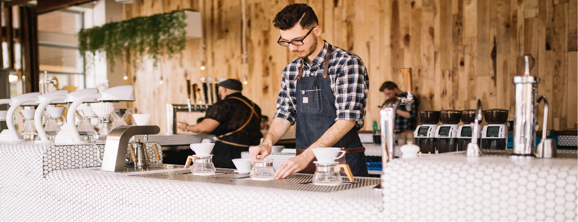 Man working at coffee counter