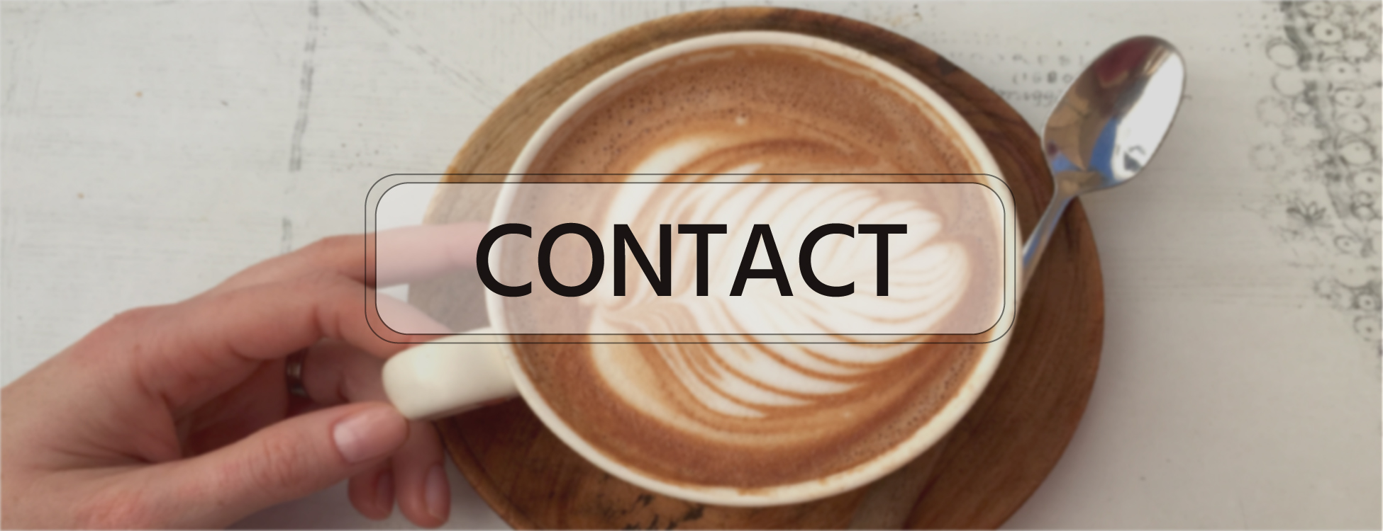 Hand reaching for coffee Cup