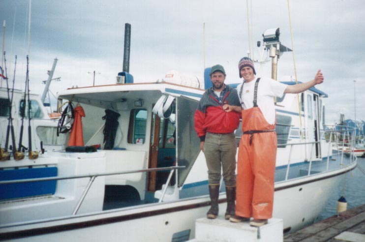 Captain Mike and Deckhand Brandon in front of the Sea Witch