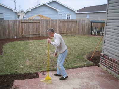 Dad finishes up the patio