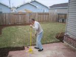 Dad finishing off the patio