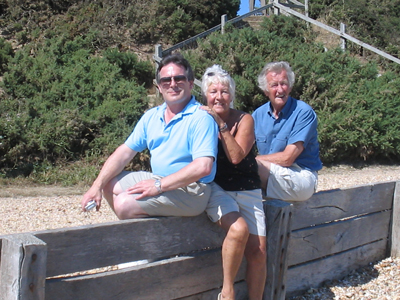 Eric with mum and dad on the beach at Lepe, July 2006
