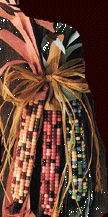 Fresh vegetables and decorative corn.