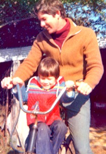 What I want to know is this: why am I wearing a big red bib? And why no elbow pads?