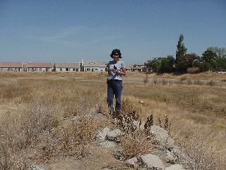 Aciu stand over the cache.
