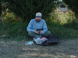 John logging the find.