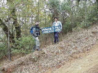 John and Aciu at a landmark.